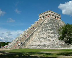People climbing stairs of El Castillo
