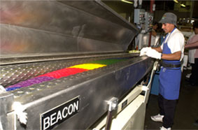 stretching the candy in the rollers