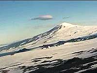 helicopter landing in a cone Mt. Morning