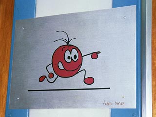 cartoon dot pointing sign